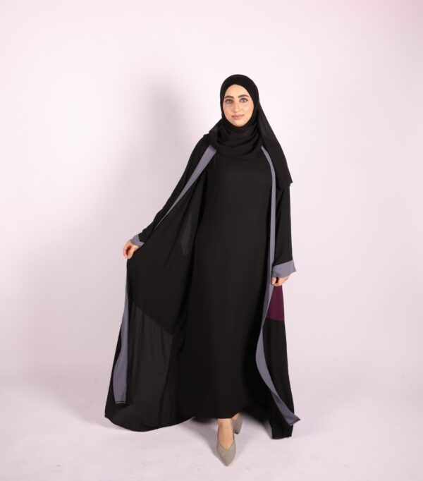 A two-piece abaya in black with subtle accents in gray and berry - Image 2